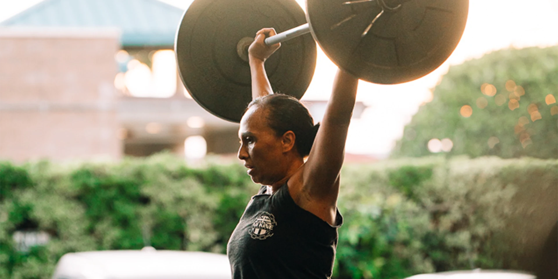 woman lifting heavy weight at All Kine Community and Fitness